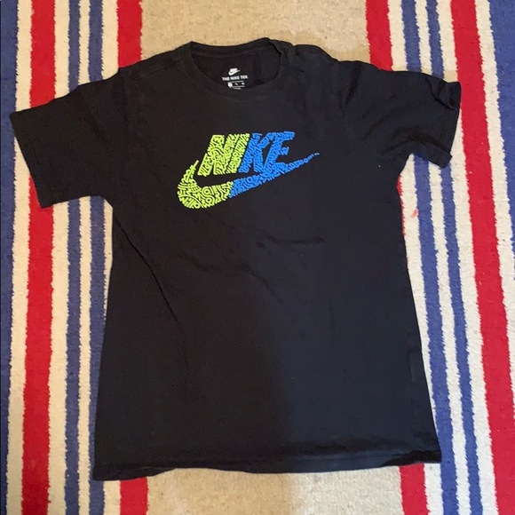 green and yellow nike shirt